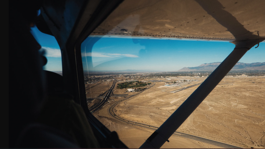 A remote area of land from the window of Clyde's plane.