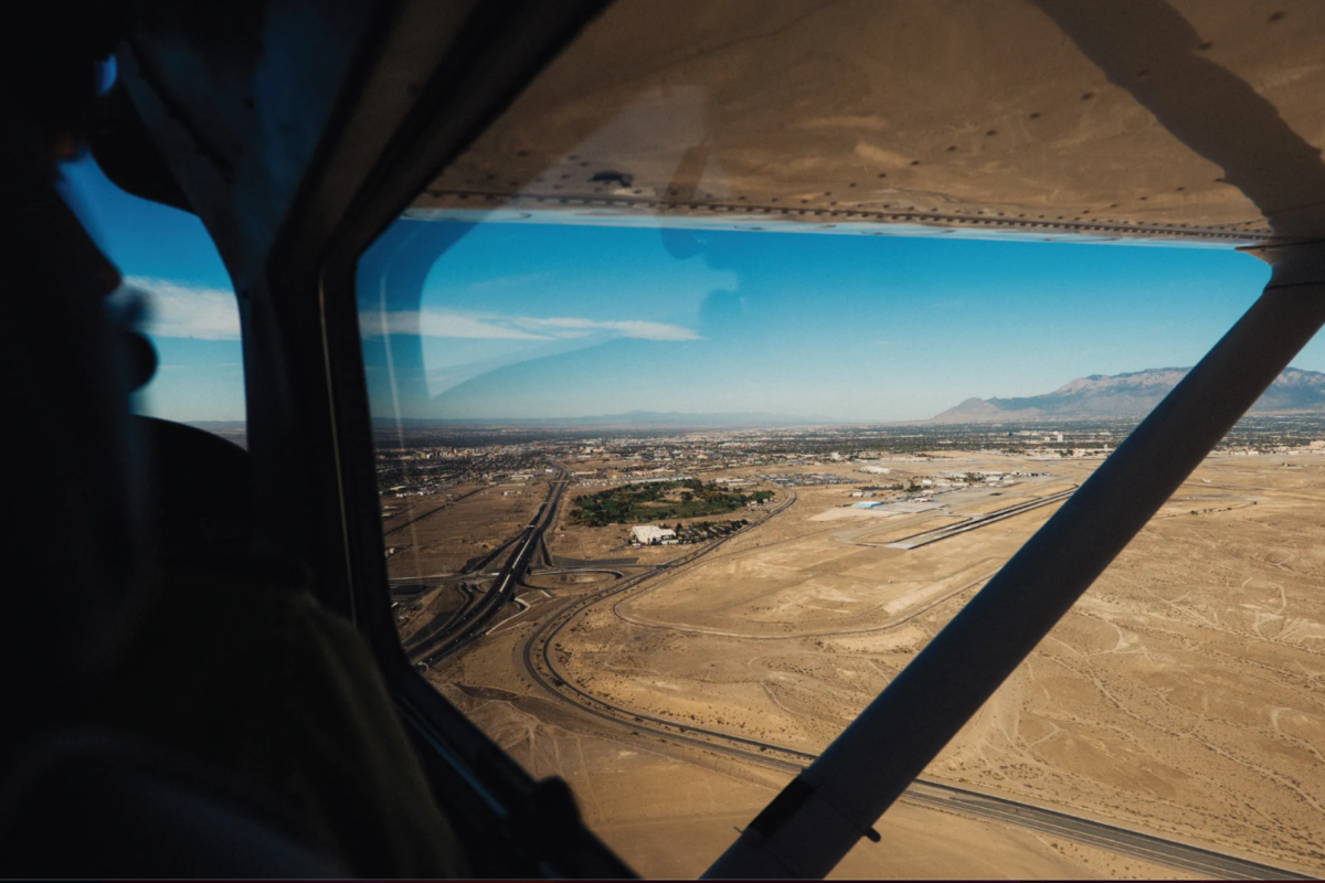 A remote area of land from the window of Clyde's plane.