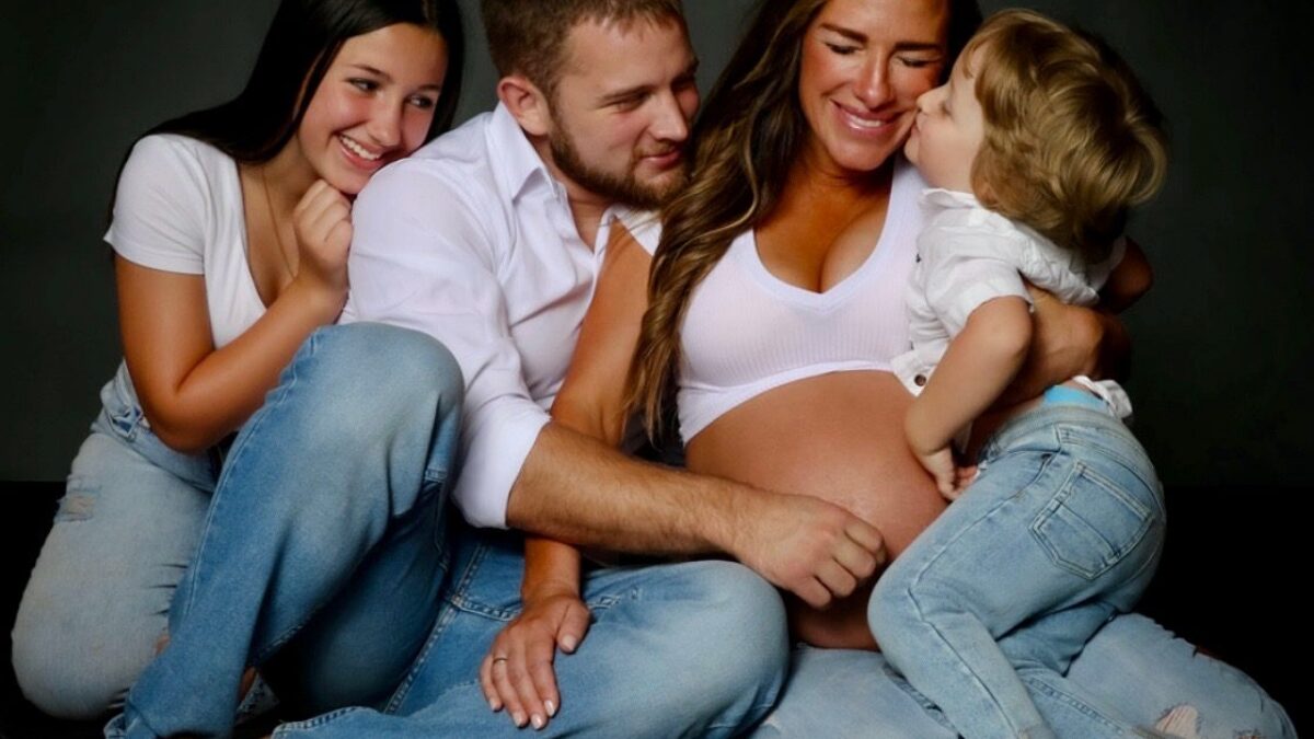 Jess, Miljan, and two of their children when she was pregnant for their now-2 year old. COURTESY PHOTO: Jess Djukanovic