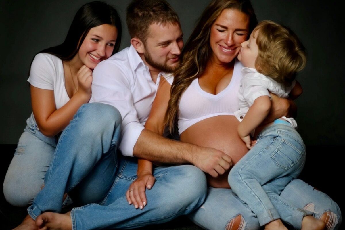 Jess, Miljan, and two of their children when she was pregnant for their now-2 year old. COURTESY PHOTO: Jess Djukanovic