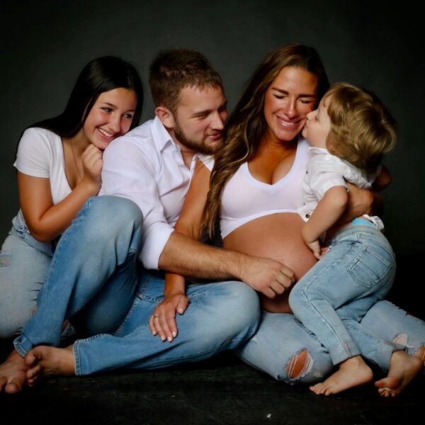 Jess, Miljan, and two of their children when she was pregnant for their now-2 year old. COURTESY PHOTO: Jess Djukanovic