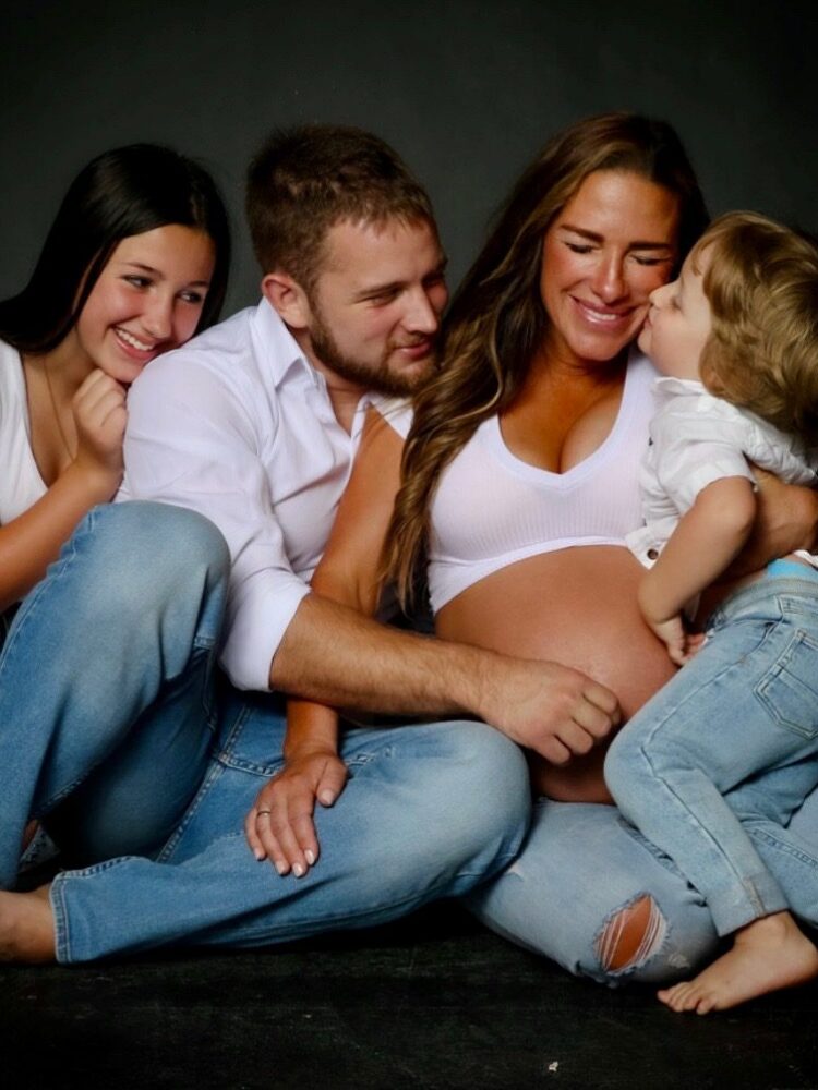 Jess, Miljan, and two of their children when she was pregnant for their now-2 year old. COURTESY PHOTO: Jess Djukanovic