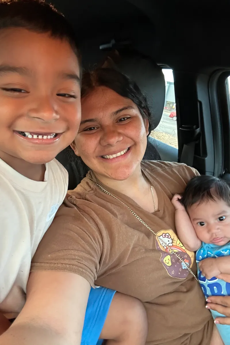 Cecil Elvir-Quinonez with her two children before being detained.