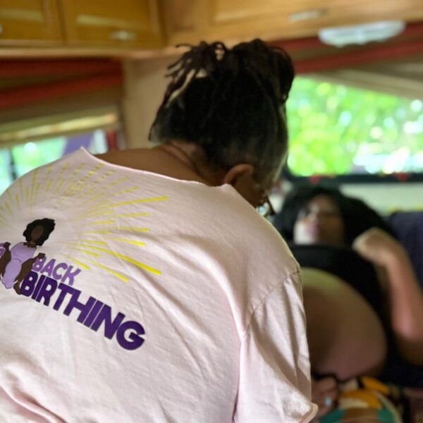 Midwife Sheila Simms Watson treats Isis Daaga during a pregnancy checkup at the Southern Birth Justice Network’s mobile midwifery clinic in Miami on March 21. (Nada Hassanein/Stateline)